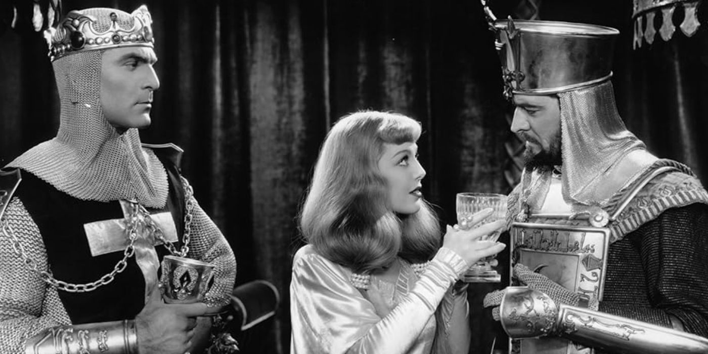 A young woman talking to a soldier while another looks on in The Crusaders (1935)