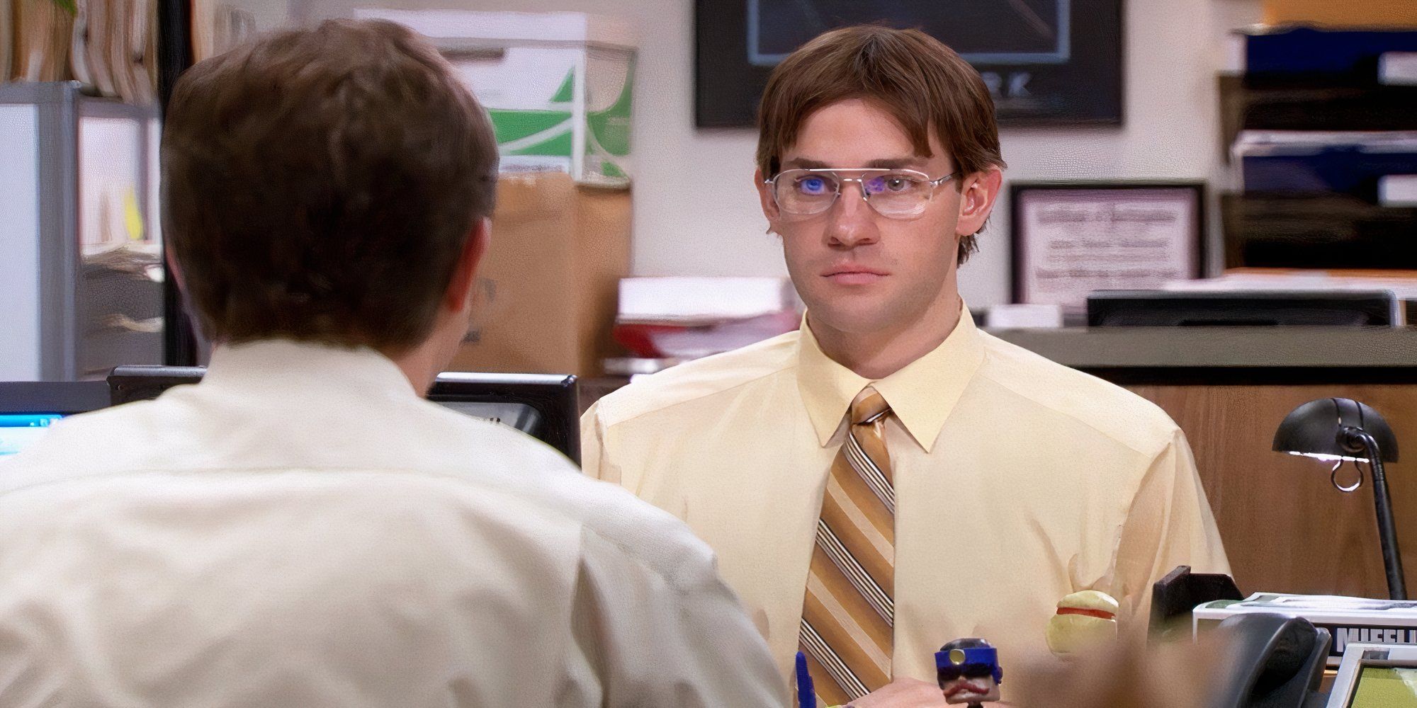 Jim pranks Dwight by dressing as him. 