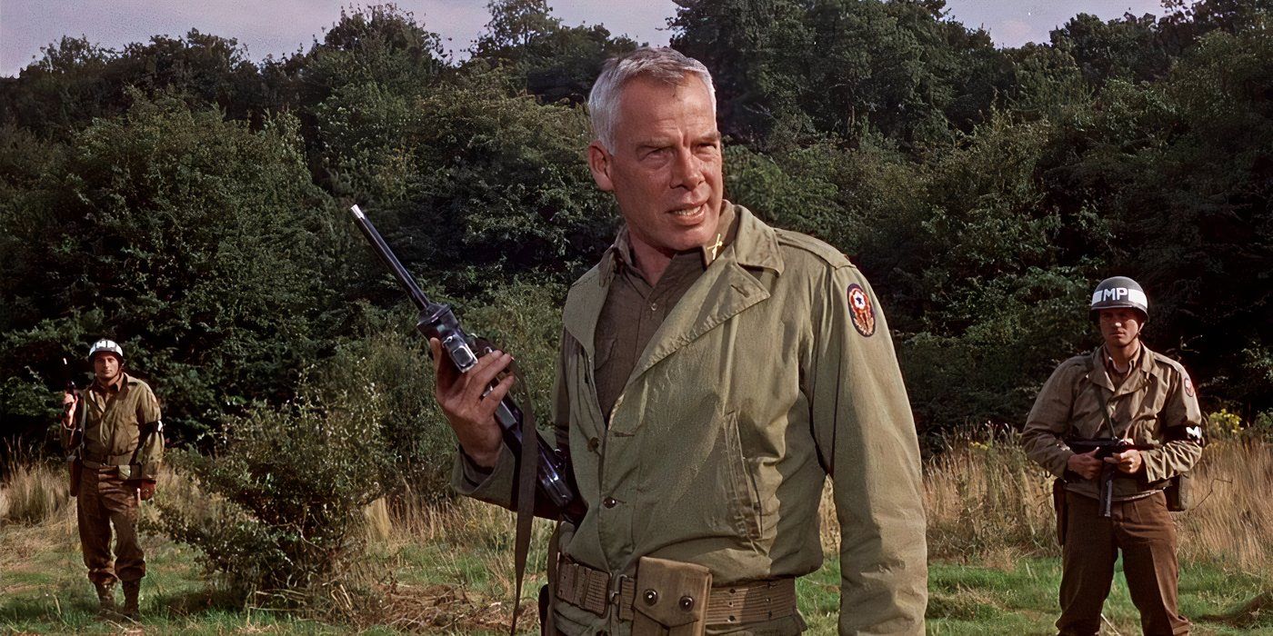 Lee Marvin as John Reisman poses with a pistol