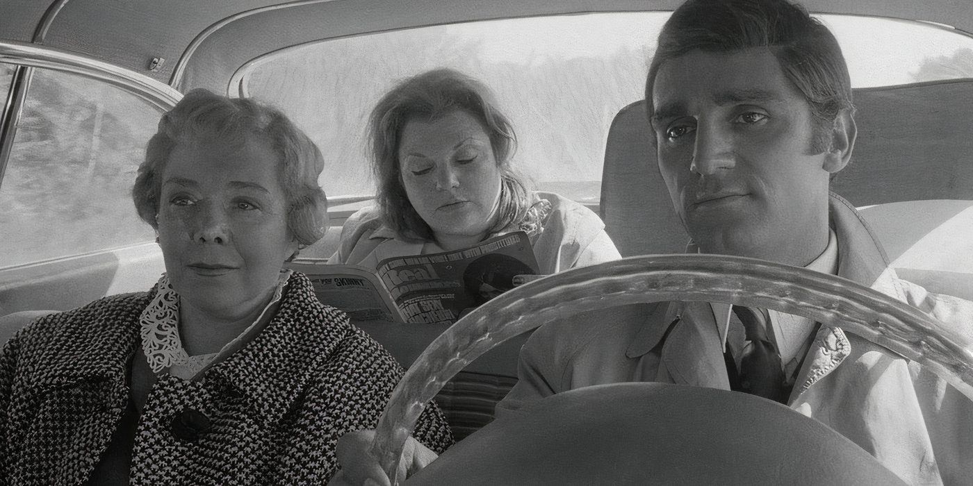 Bunny (Doris Roberts) sits in the car passenger seat as Raymond (Tony Lo Bianco) drives and Martha (Shirley Stoler) sits in the back, reading a magazine. 