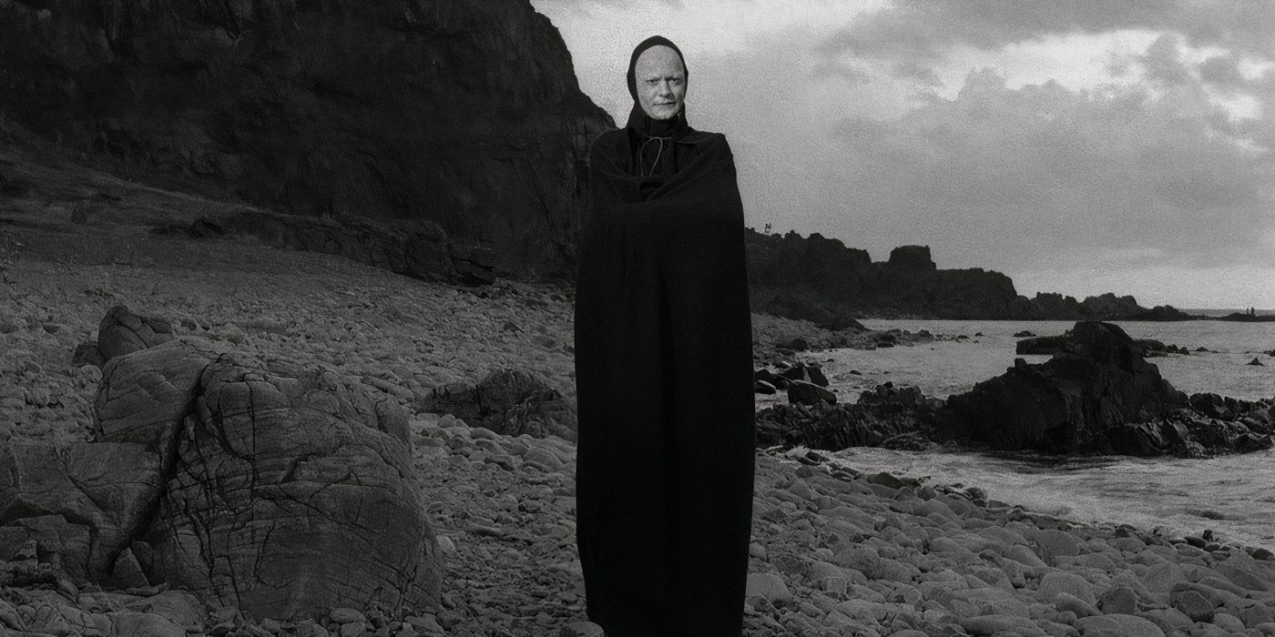 Bengt Ekerot as Death stands on a picturesque beach in The Seventh Seal