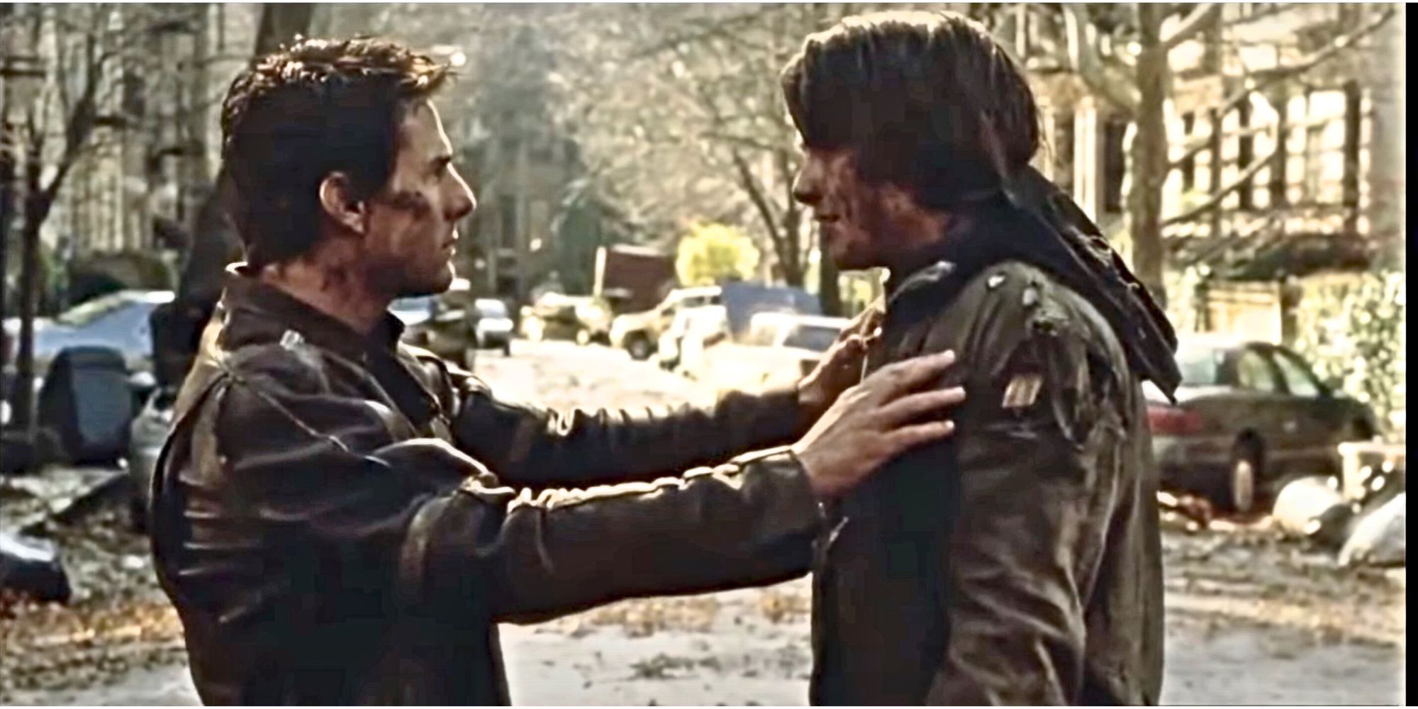 Ray, played by Tom Cruise, looking with affection at his son, played by Justin Chatwin