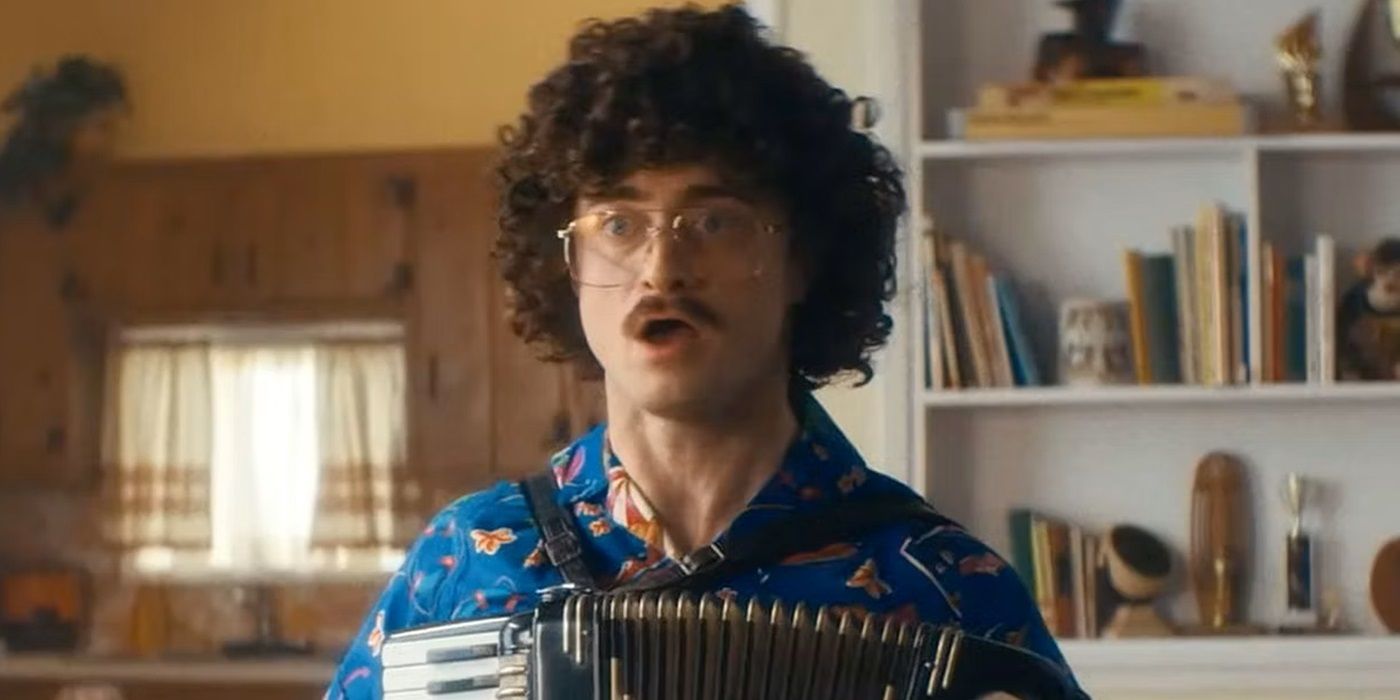 Weird Al holding an accordion in his living room in Weird: The Al Yankovic Story