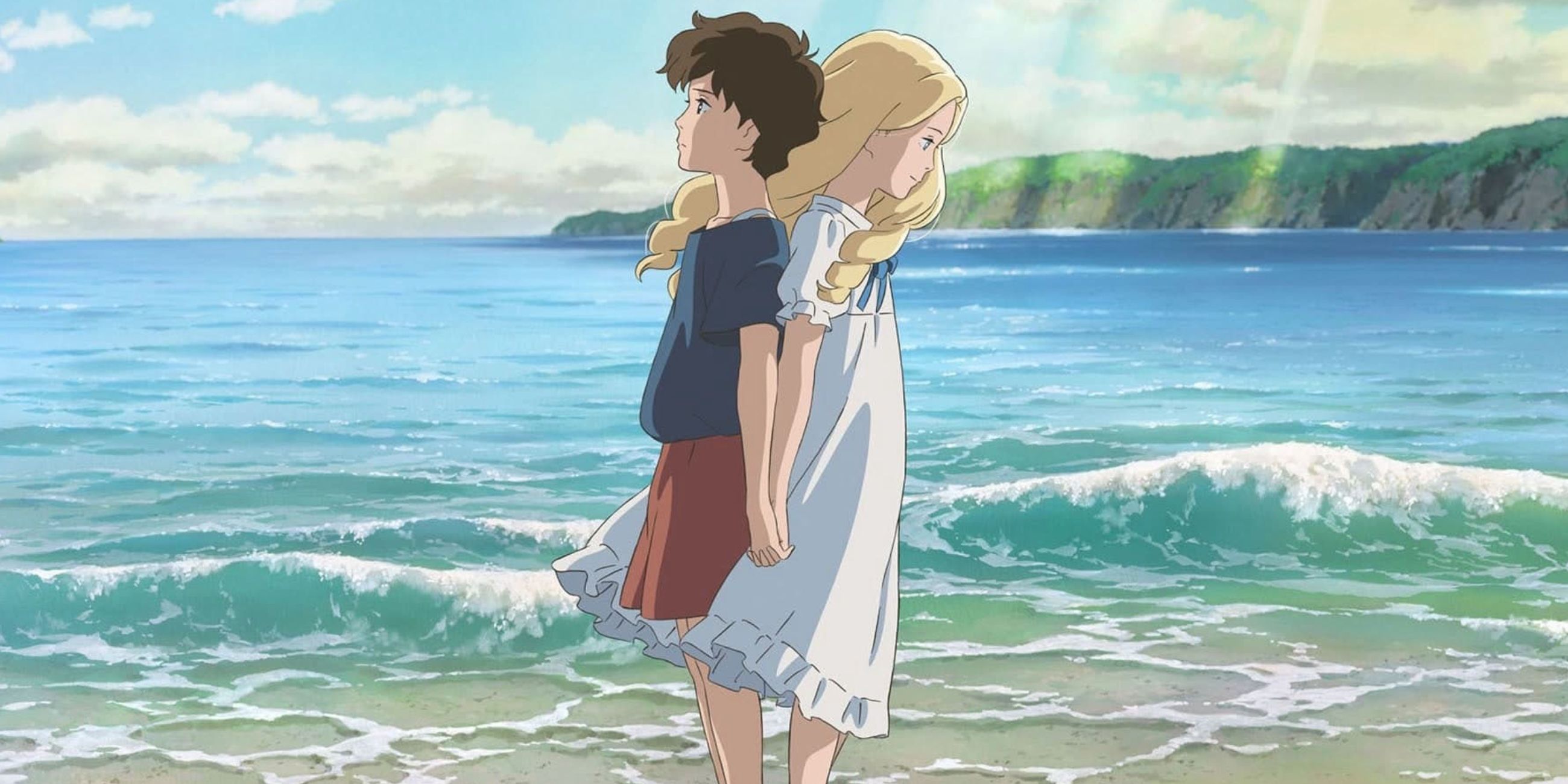 Anna and Marnie stand on a beach in 'When Marnie Was There'