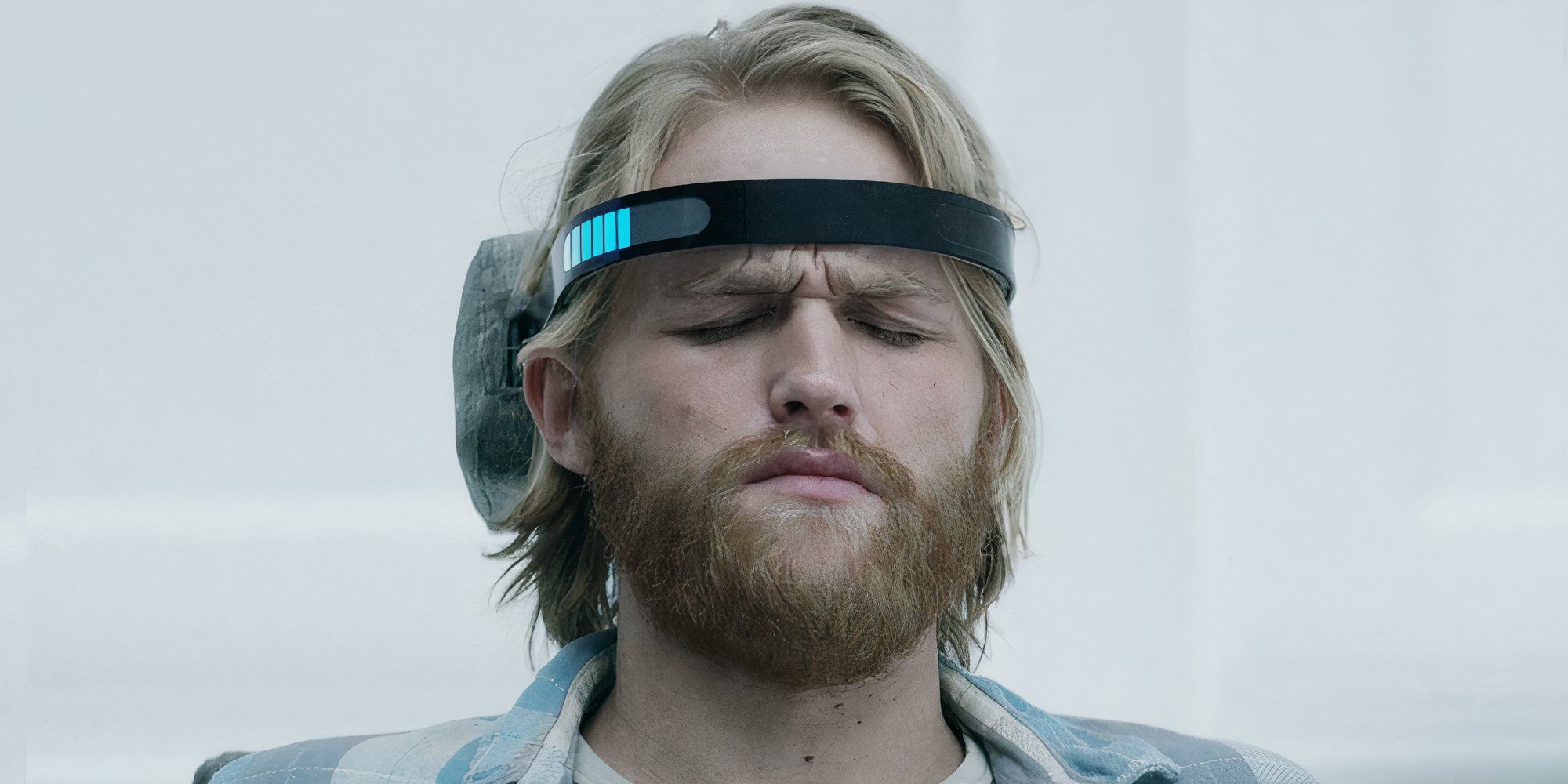 Wyatt Russell as Cooper in Black Mirror Playtest looking like he's in pain.