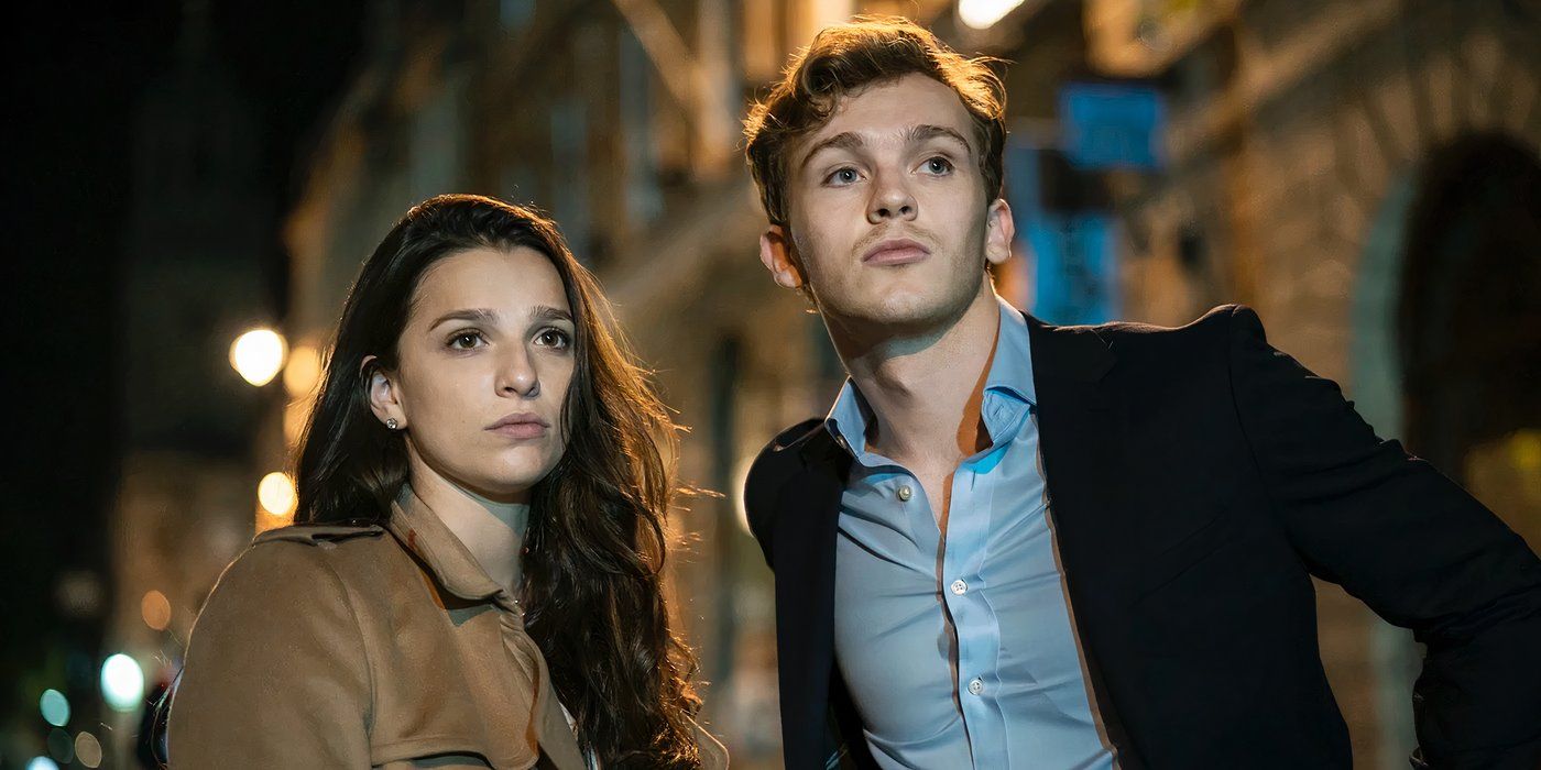 Yasmin and Robert outside in the dark look at something in the distance in HBO’s Industry