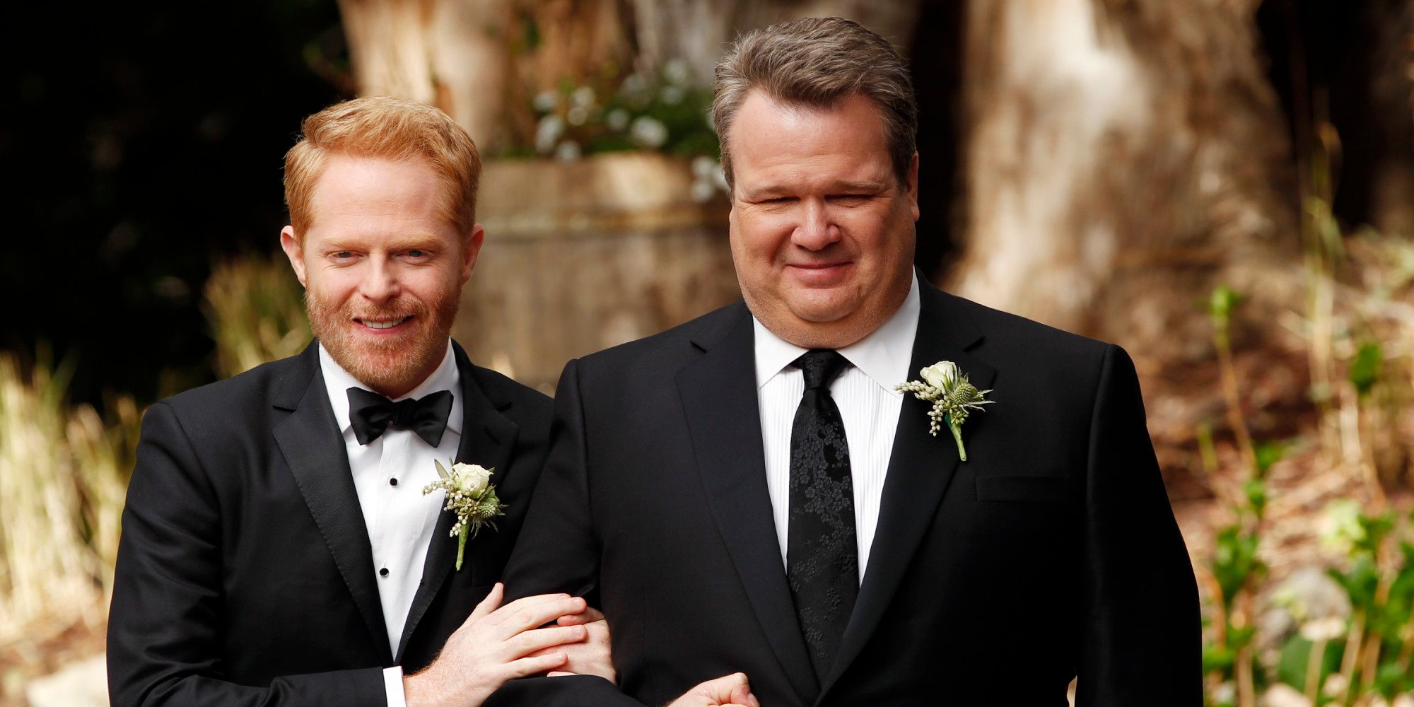 Mitchell and Cam Walking Down the Aisle