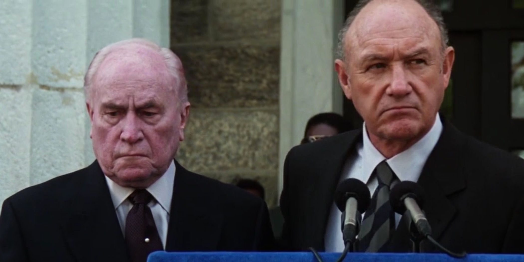 Absolute Power - Close up of Gene Hackman (as President Richmond) standing at a podium, standing next to a grieving EG Marshall