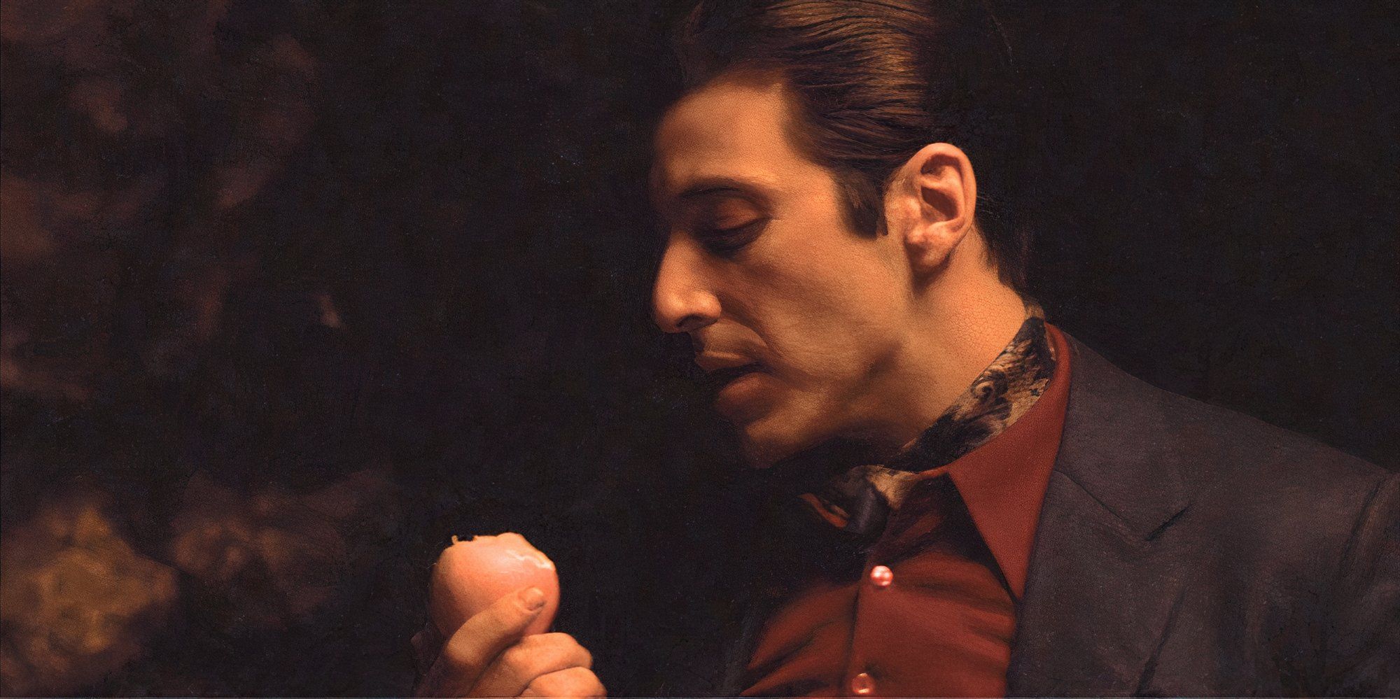 Al Pacino as Michael Corleone peeling an orange in The Godfather: Part II (1974)