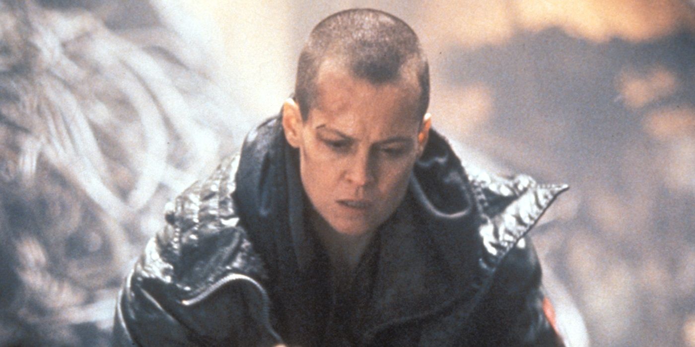 Sigourney Weaver as Ellen Ripley looking down in surprise in Alien 3 (1992)