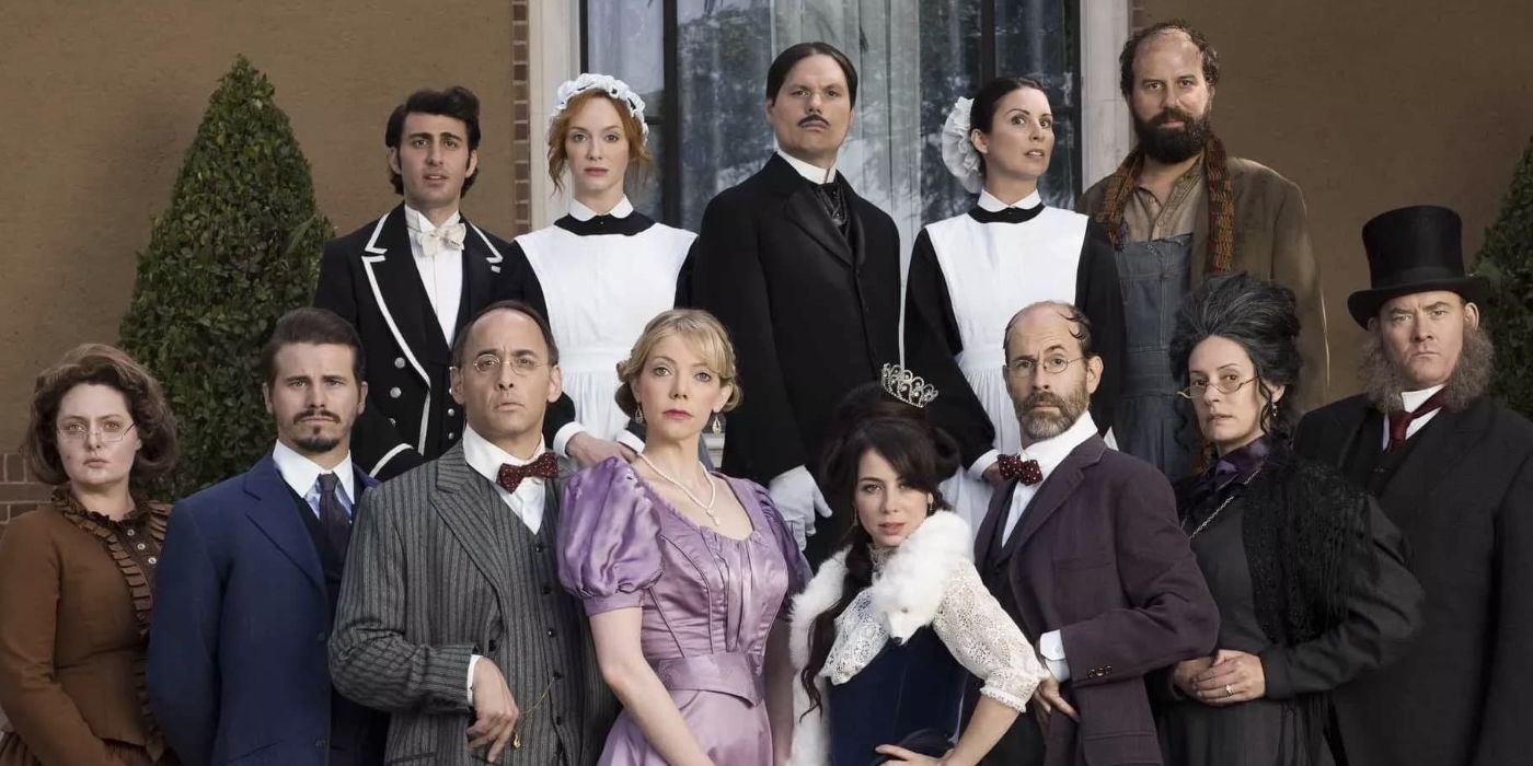 The cast of the show Another Period posing for the camera