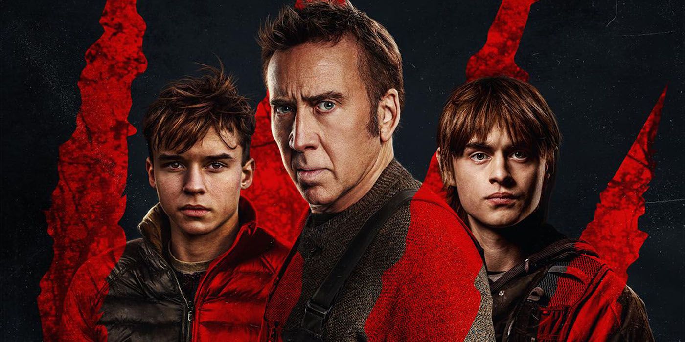 Jaeden Martell, Nicolas Cage, and Maxwell Jenkins stand side by side looking straight at us in the poster for Arcadian. 