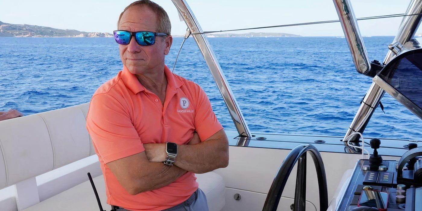 Captain Glenn with his arms folded on a boat on 'Below Deck Sailing Yacht.'