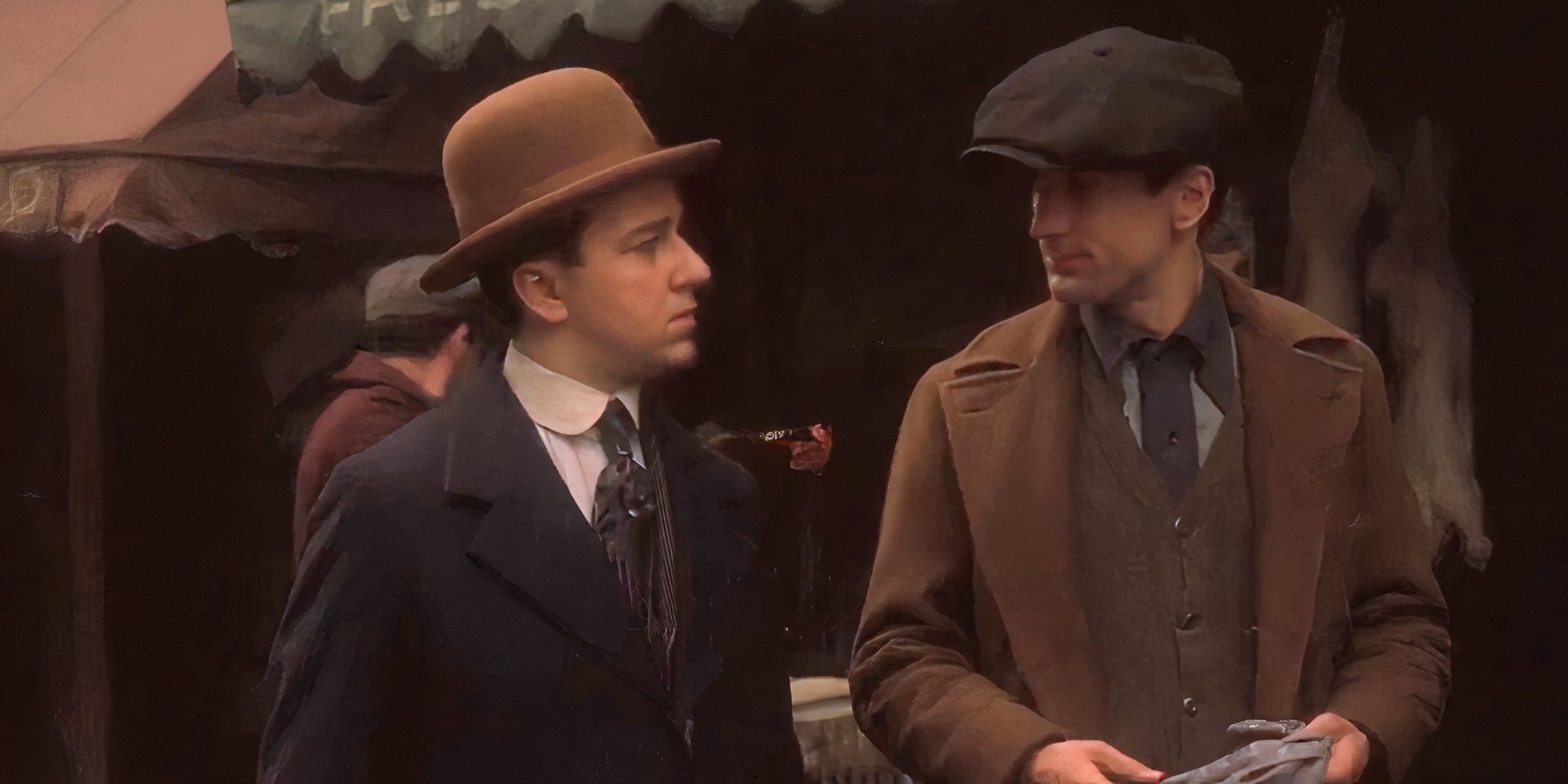 Peter Clemenza looking at Vito Corleone on a street outside in The Godfather: Part II