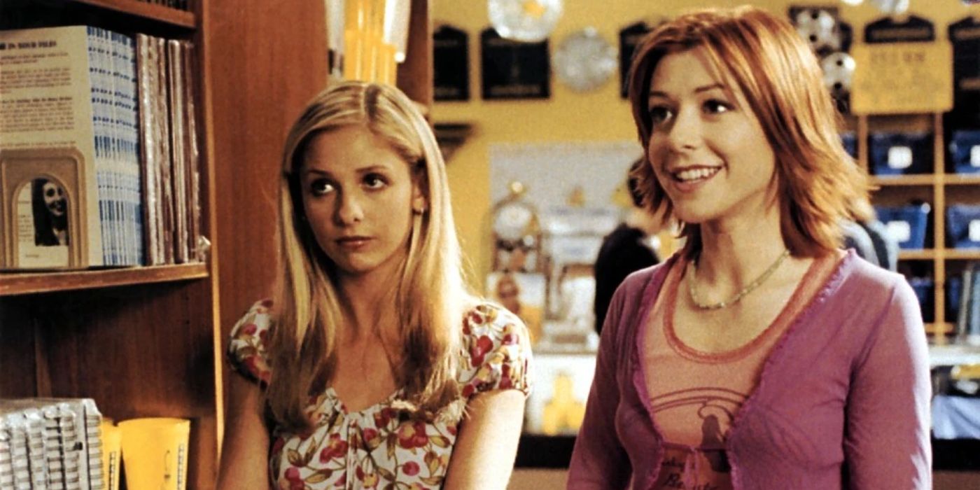 Buffy (Sarah Michelle Gellar) and Willow (Alyson Hannigan) stand in a library