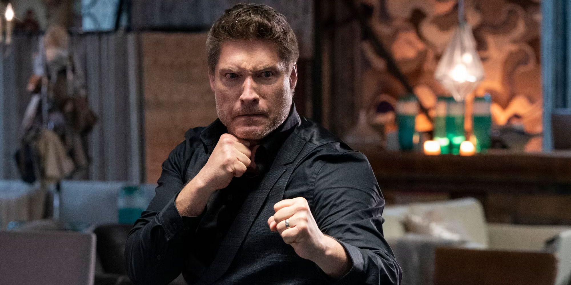 Sean Kanan as Mike Barnes ready to fight with fists up in Cobra Kai