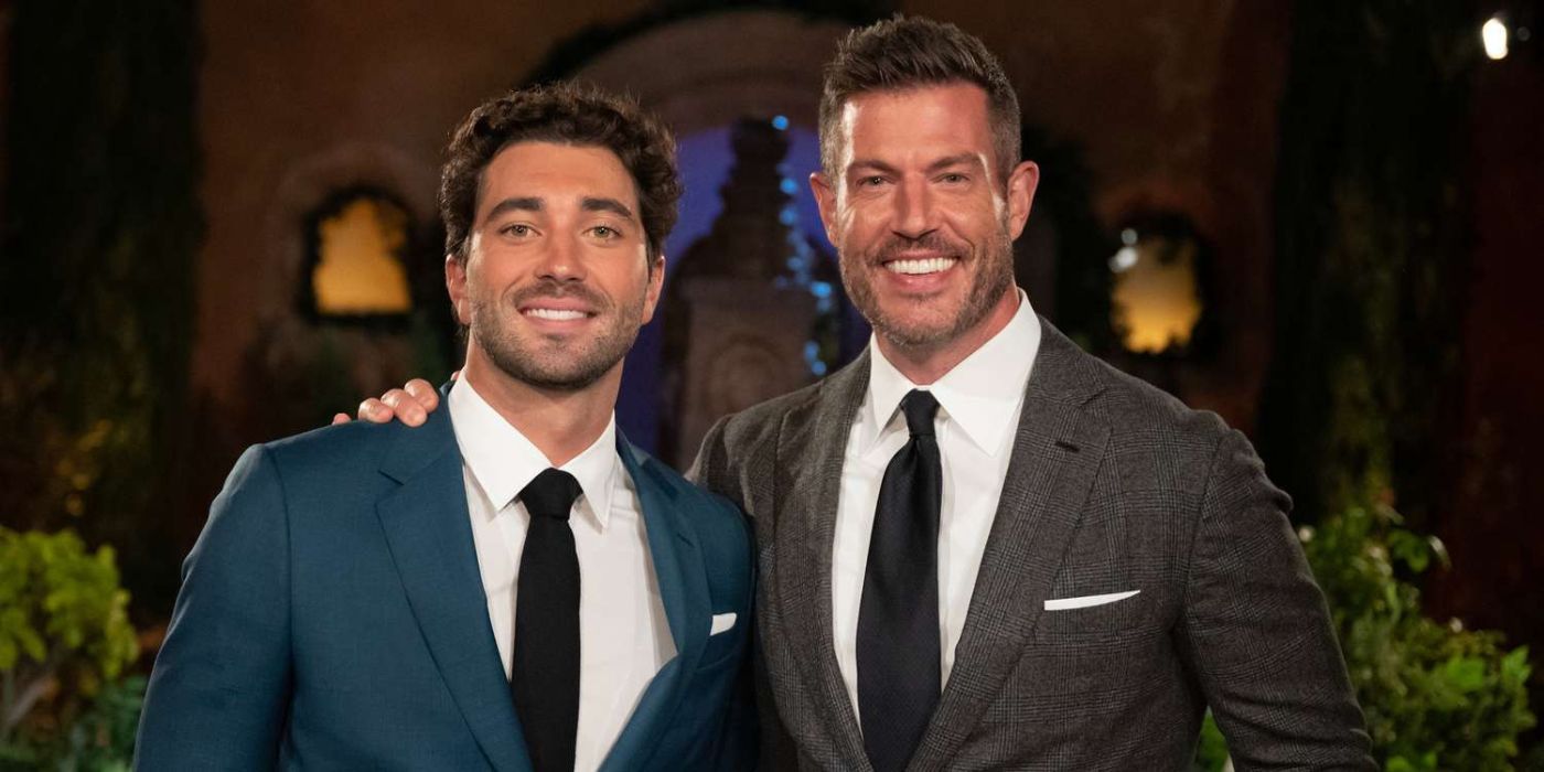 Joey Graziadei and Jesse Palmer with his arm around Joey smiling during "The Bachelor.