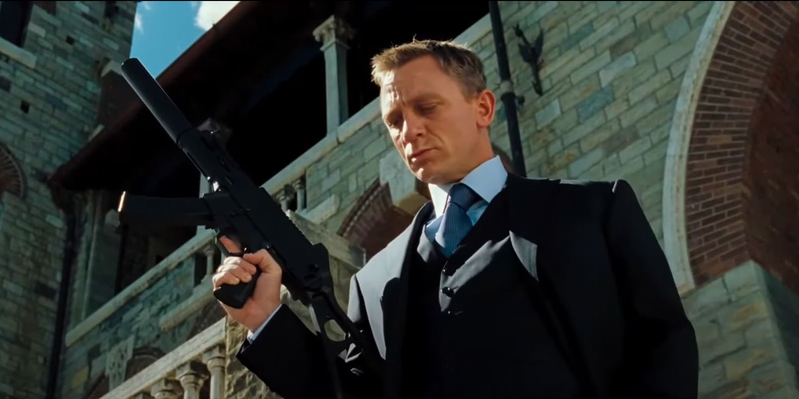 Daniel Craig as James Bond 007, holding a gun at the end of Casino Royale.