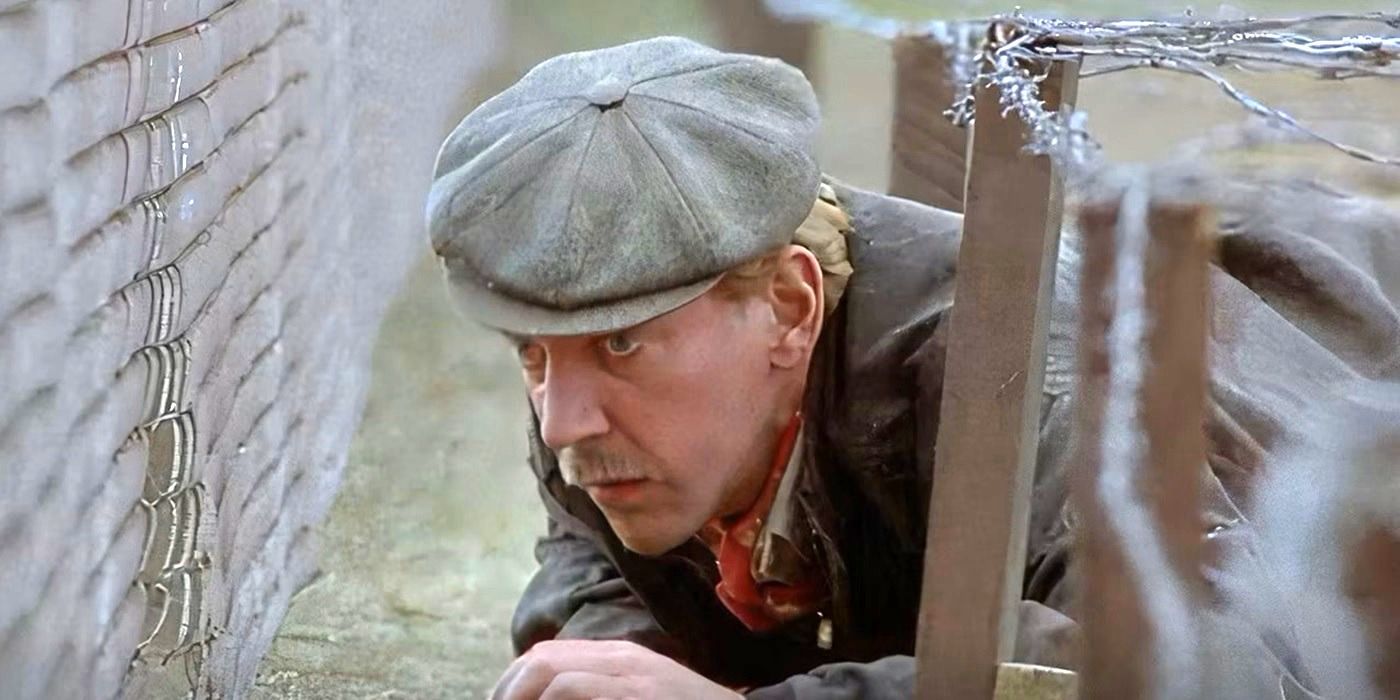 Henry Faber (Donald Sutherland) sneaking into a military base in the spy thriller Eye of the Needle (1981)