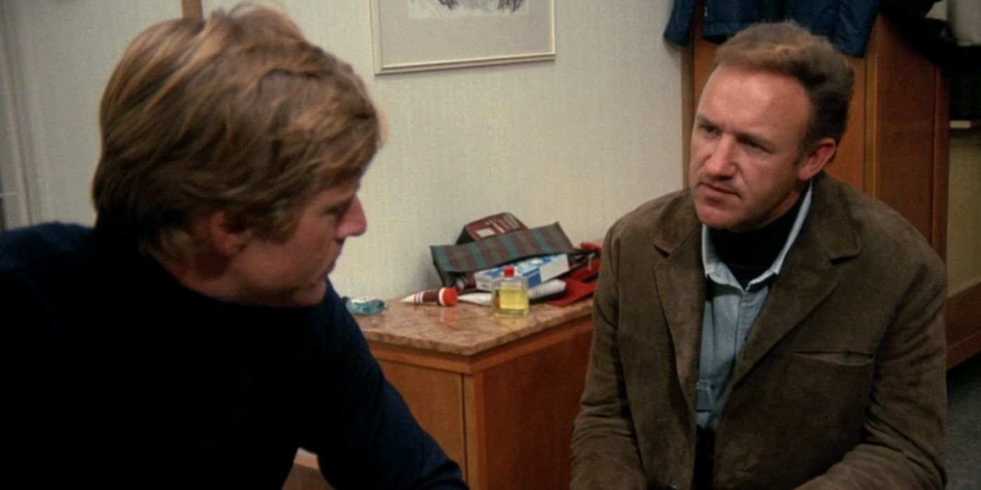 Robert Redford and Gene Hackman in the middle of a conversation in Downhill Racer