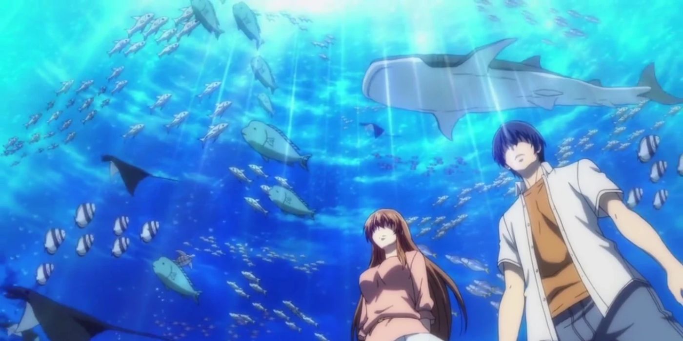 Iori and Nanaka standing under aquarium with fish and whales in grand blue