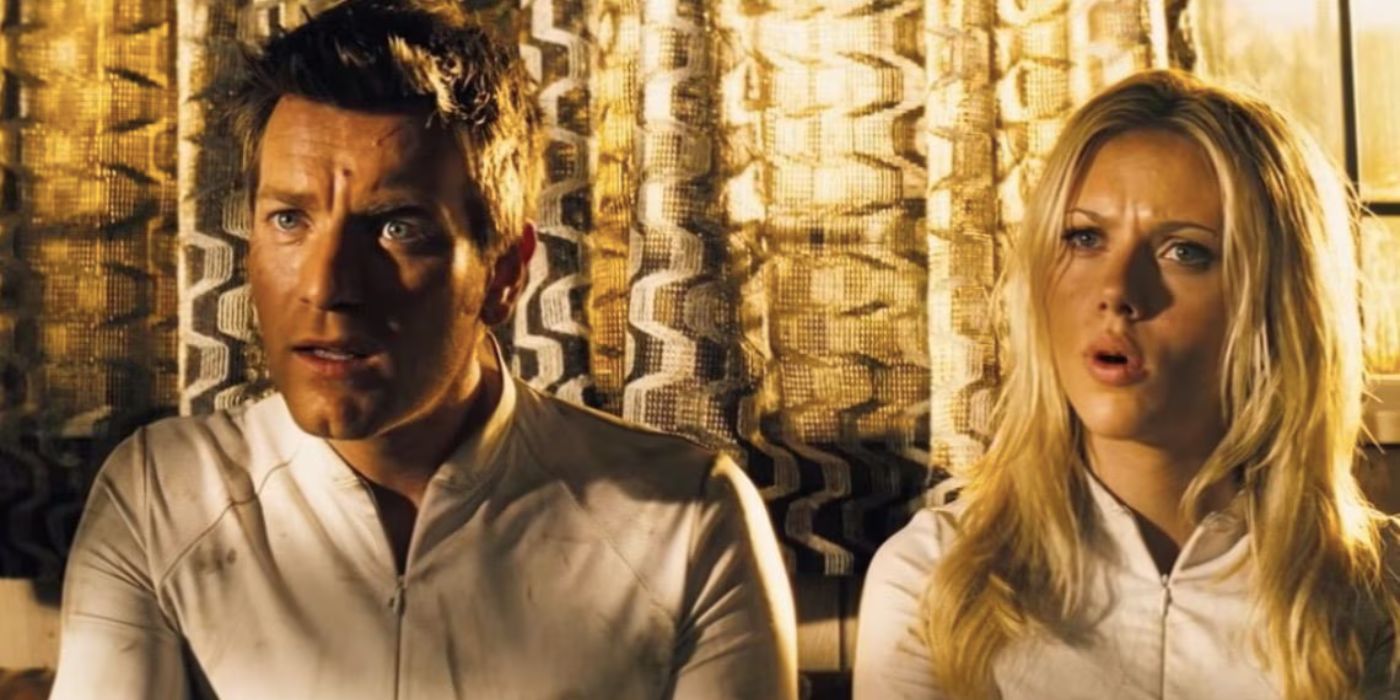 Ewan McGregor and Scarlett Johansson looking perplexed on a couch in The Island