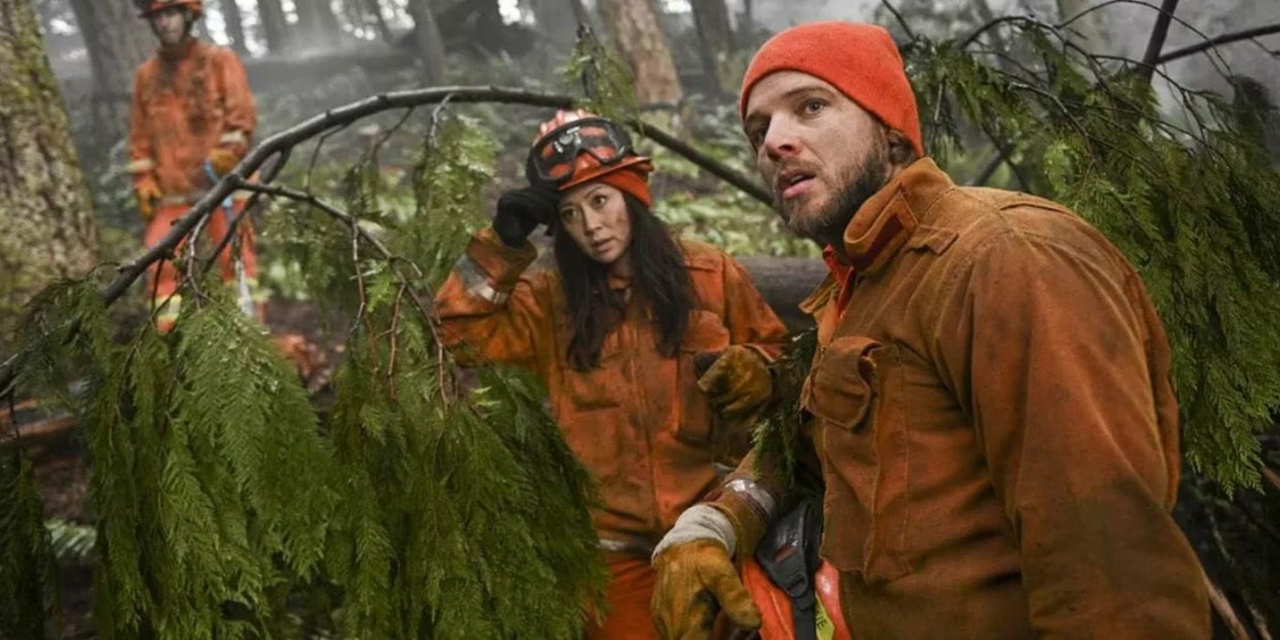 Rebecca Lee (Fiona Rene) and Bode Leone (Max Thieriot) on a job in the woods on 'Fire Country.'