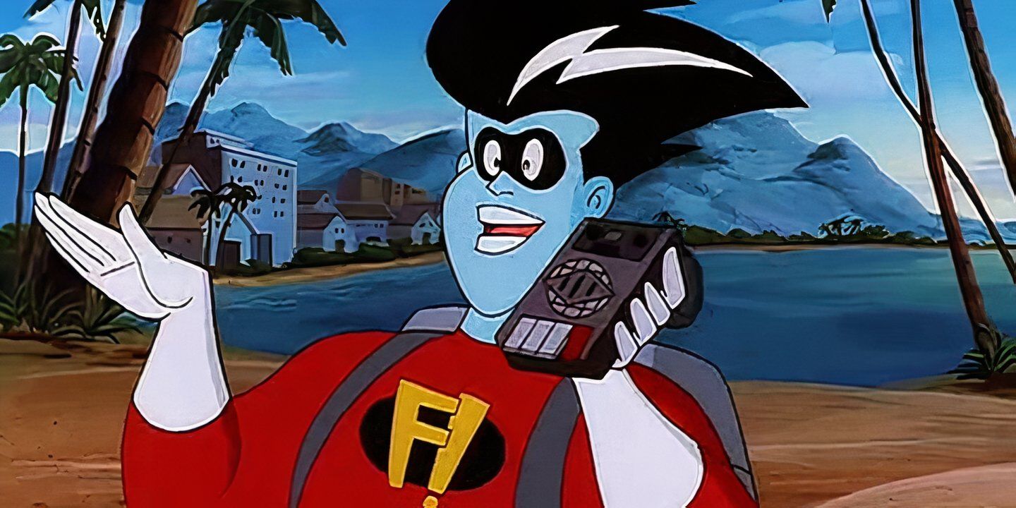 Freakazoid talking on a recording device while on a sandy beach in &lsquo;Freakazoid!'