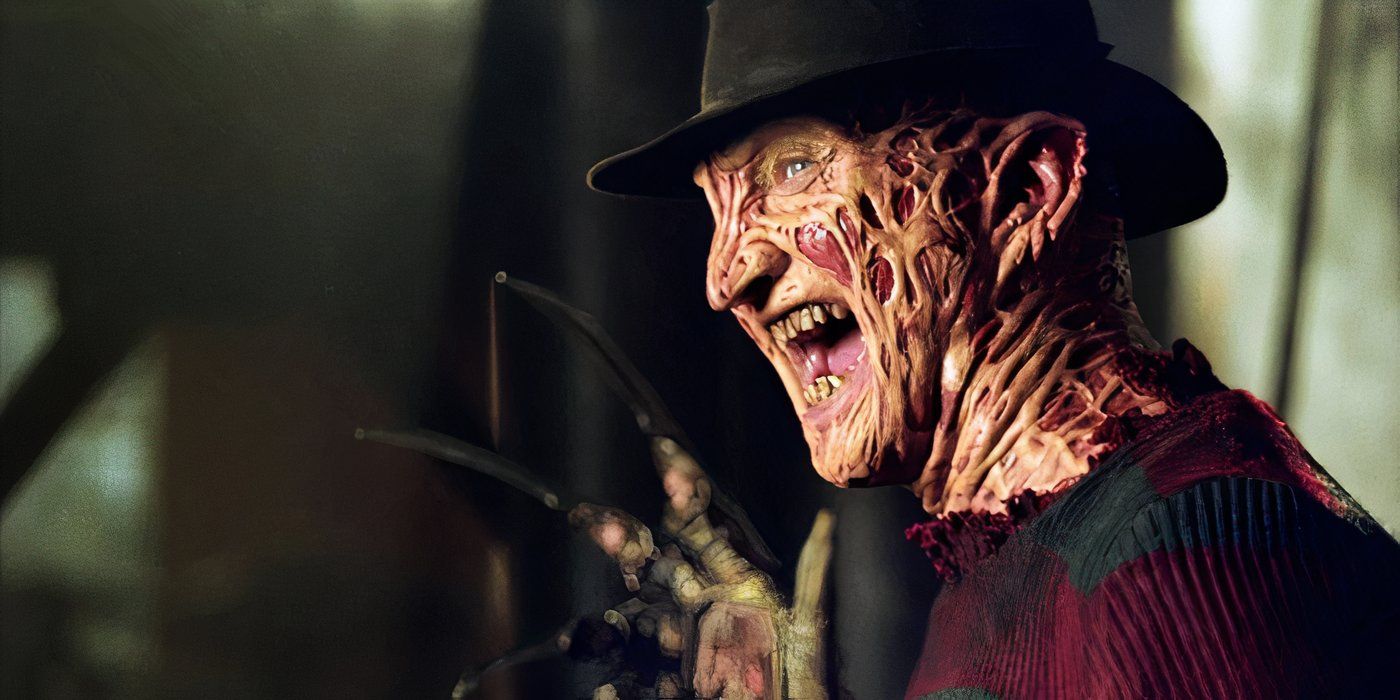 Robert Englund as Freddy laughing while raising his glove in 'A Nightmare on Elm Street' (1984)