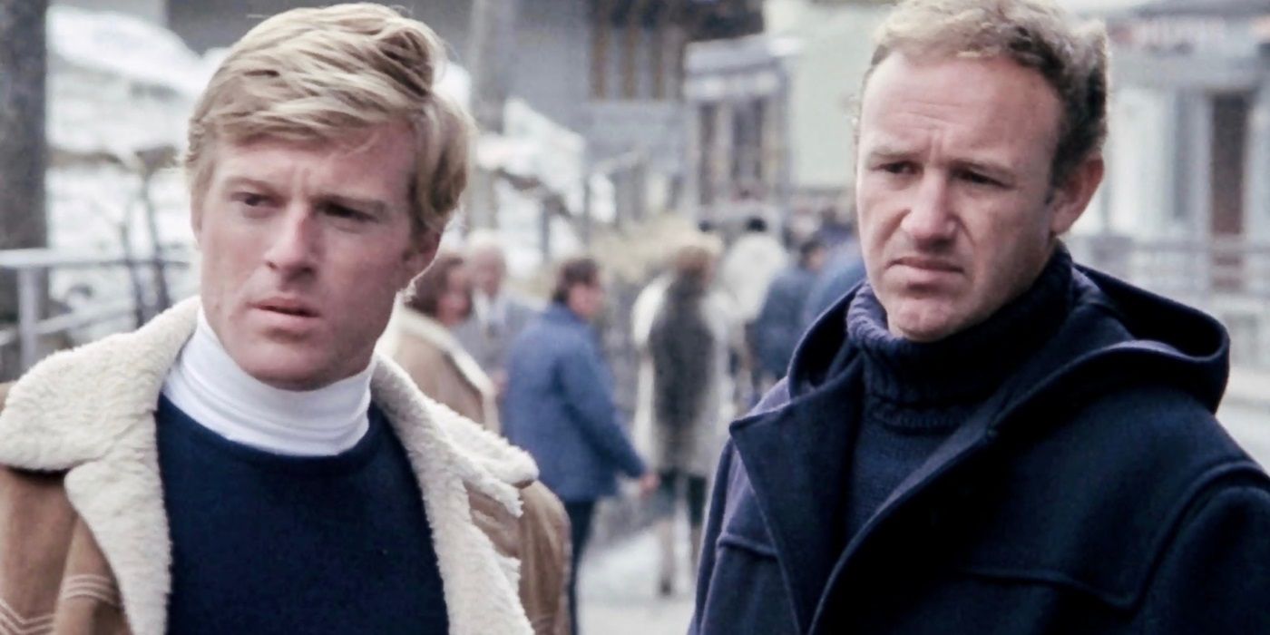 Robert Redford and Gene Hackman looking at a person offscreen in Downhill Racer