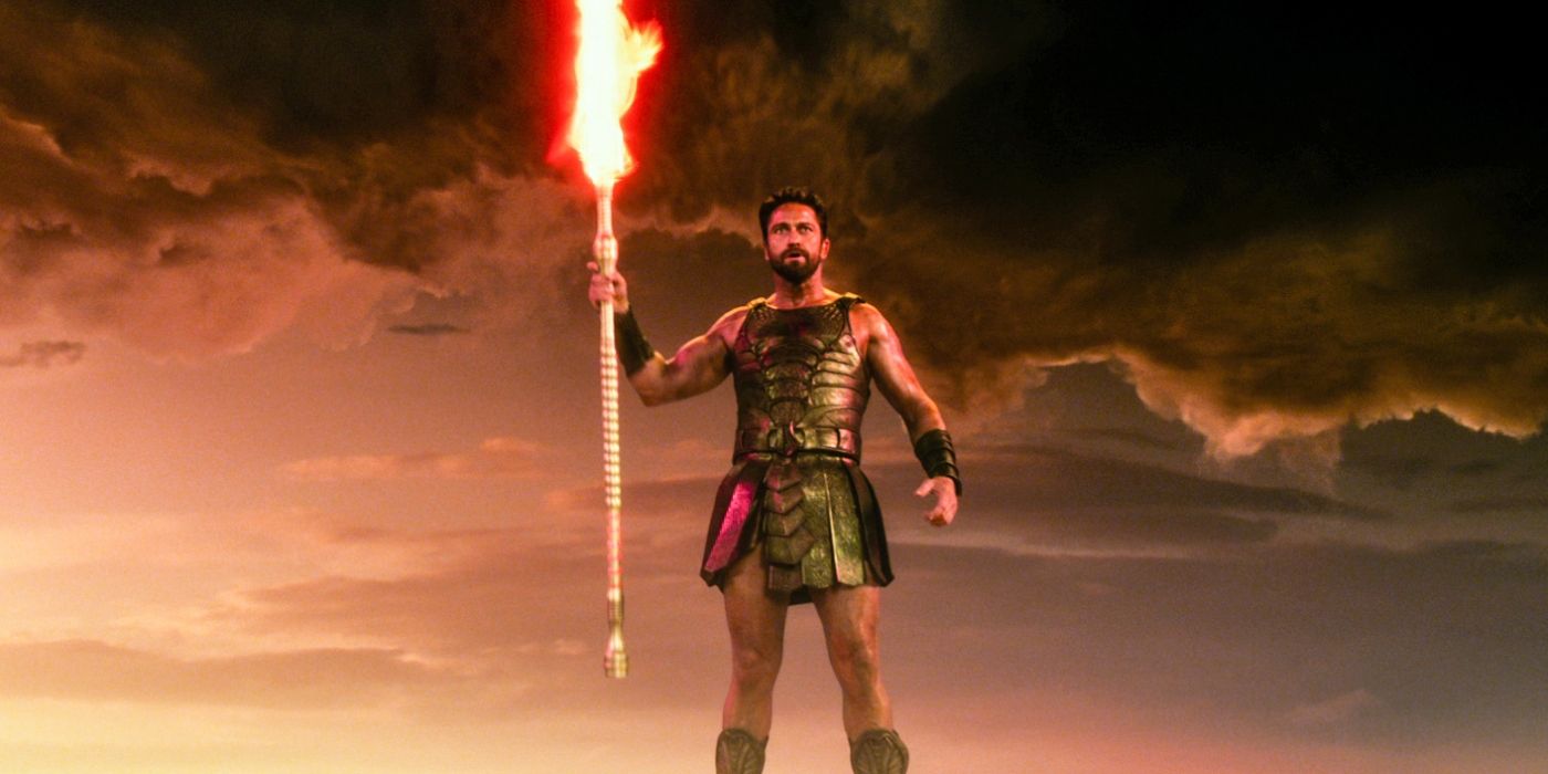 Gerard Butler as Egyptian God Set holding a weapon in the film Gods of Egypt