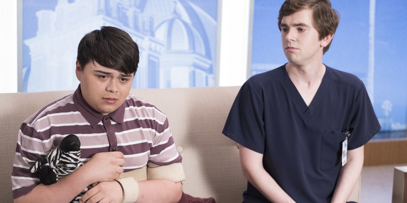 Shaun and his patient with Fragile X Syndrome sitting side by side in 'The Good Doctor'