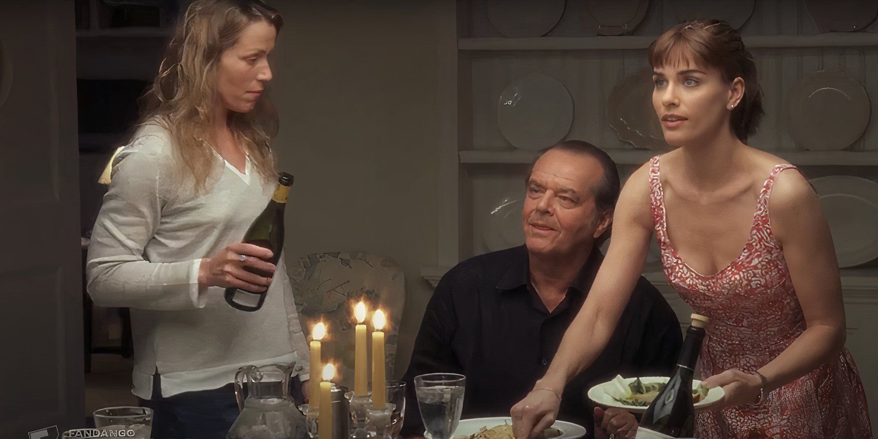 Harry (Jack Nicholson) and Marrin (Amanda Peet) sharing a family dinner in Something's Gotta Give