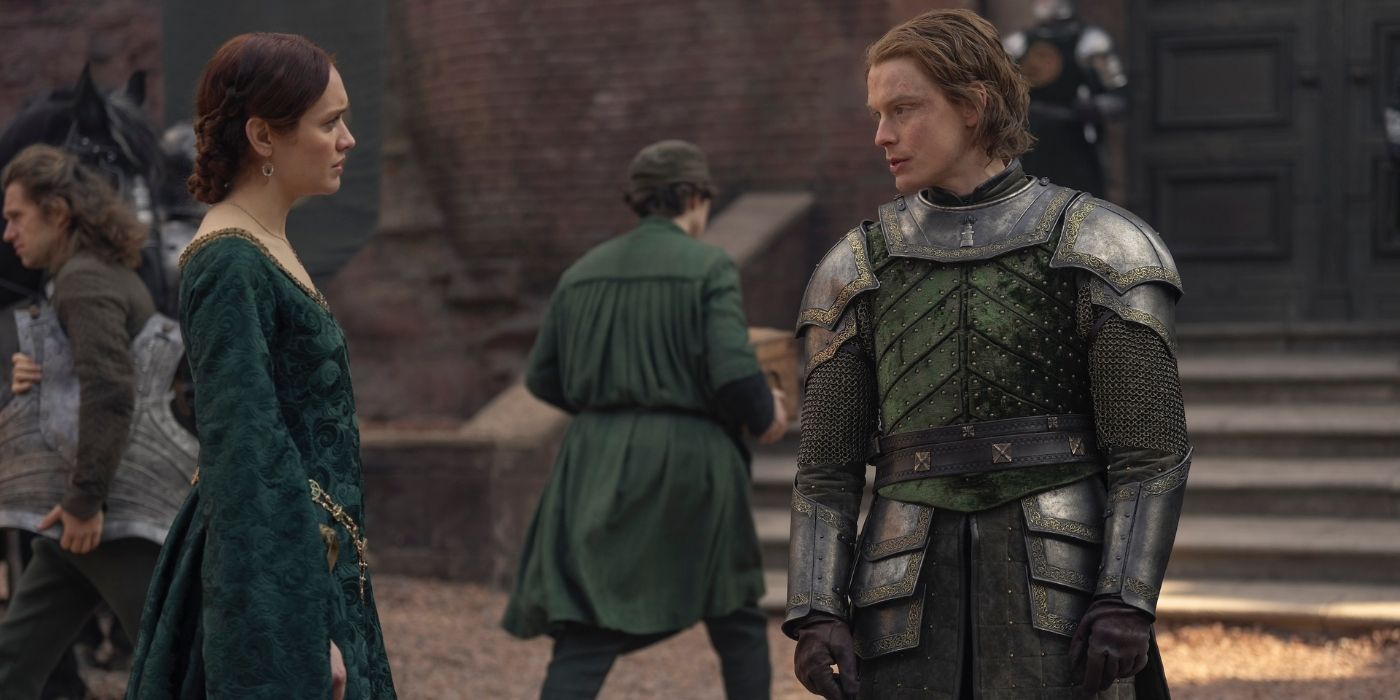 Olivia Cooke and Freddie Fox having a conversation in the courtyard in House of the Dragon Season 2