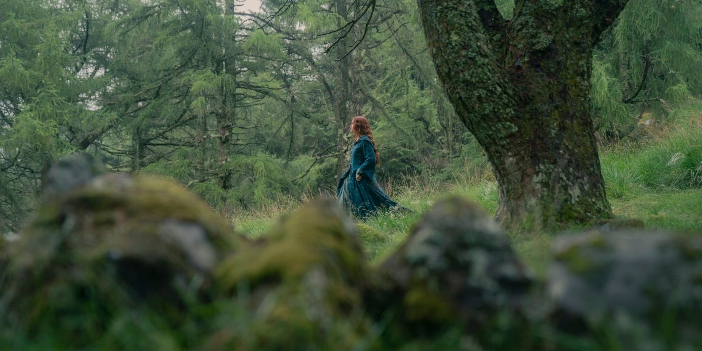 Olivia Cooke walking in the Kingswood in House of the Dragon Season 2 Episode 7