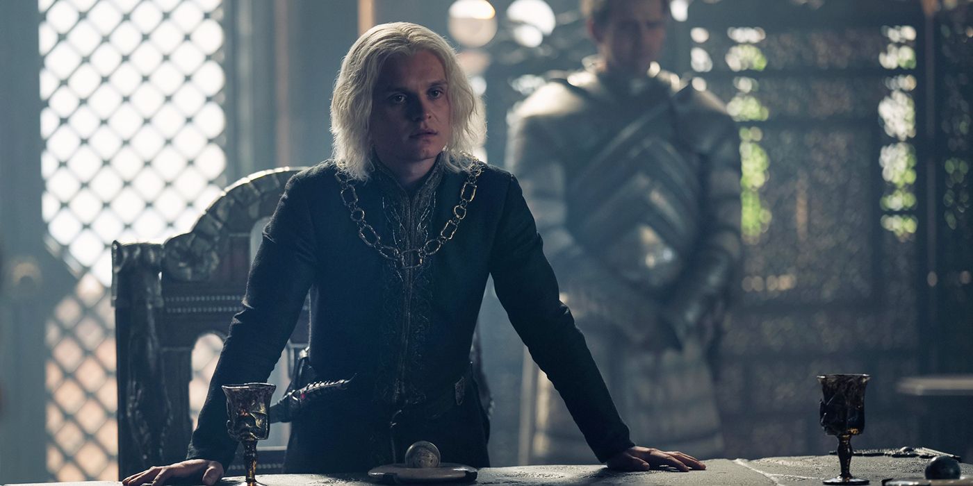 Aegon II standing in the council chamber looking annoyed in House of the Dragon Season 2 Episode 4