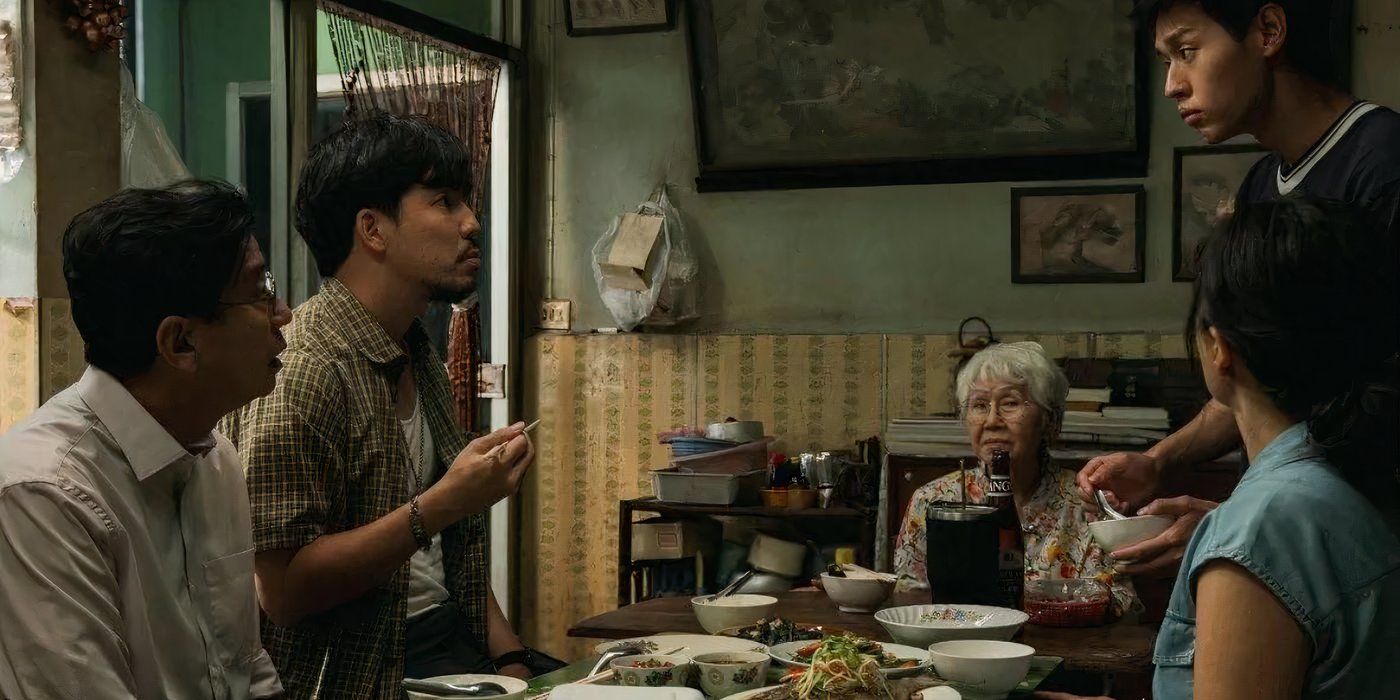 Bilkin, Usha Seamkhun and family sit around the table in How To Make Millions Before Grandma Dies