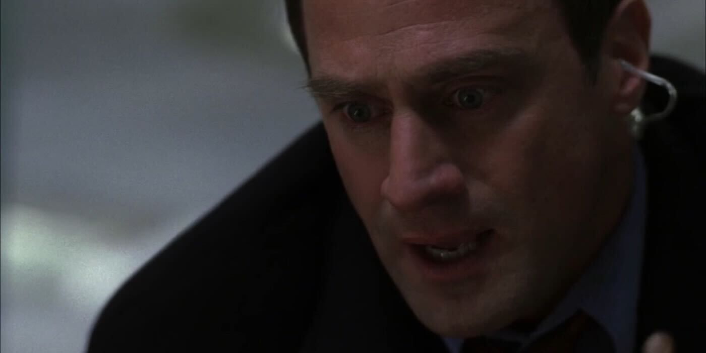 Elliot Stabler looking down fearfully at Olivia Benson. 