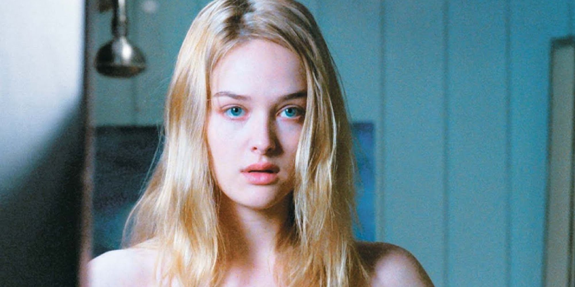 Jess Weixler as Dawn in Teeth looking in the mirror