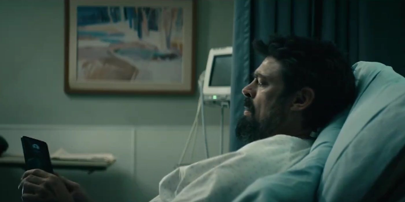 Karl Urban, holding a phone on a hospital bed, as Billy Butcher in The Boys Season 4 Episode 8