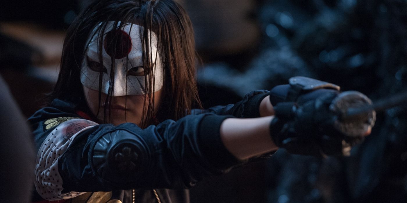 Katana staring someone down with her sword ready in Suicide Squad