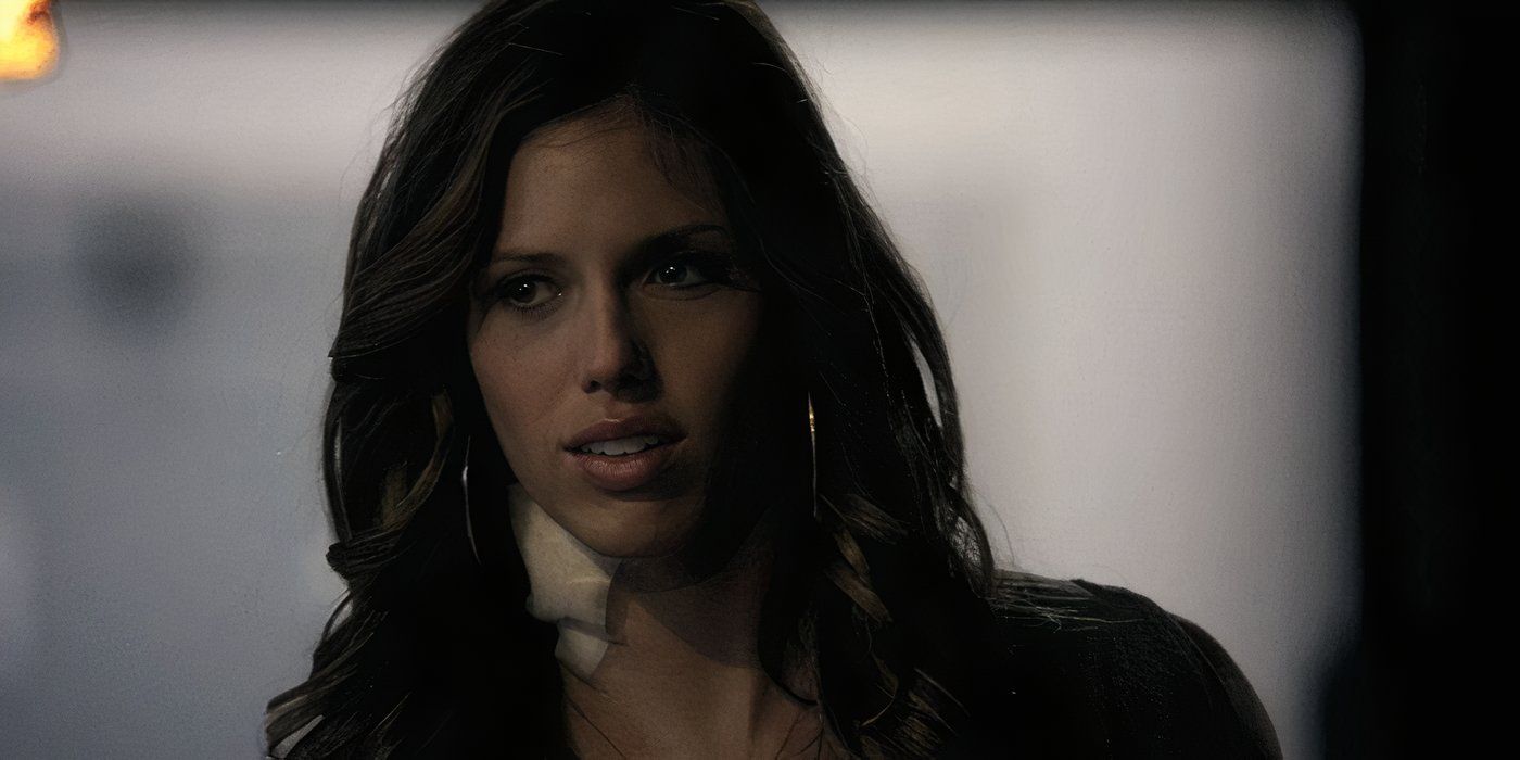 Kayla Ewell as Vicki Donovan with a bandage on her neck looks off camera in The Vampire Diaries