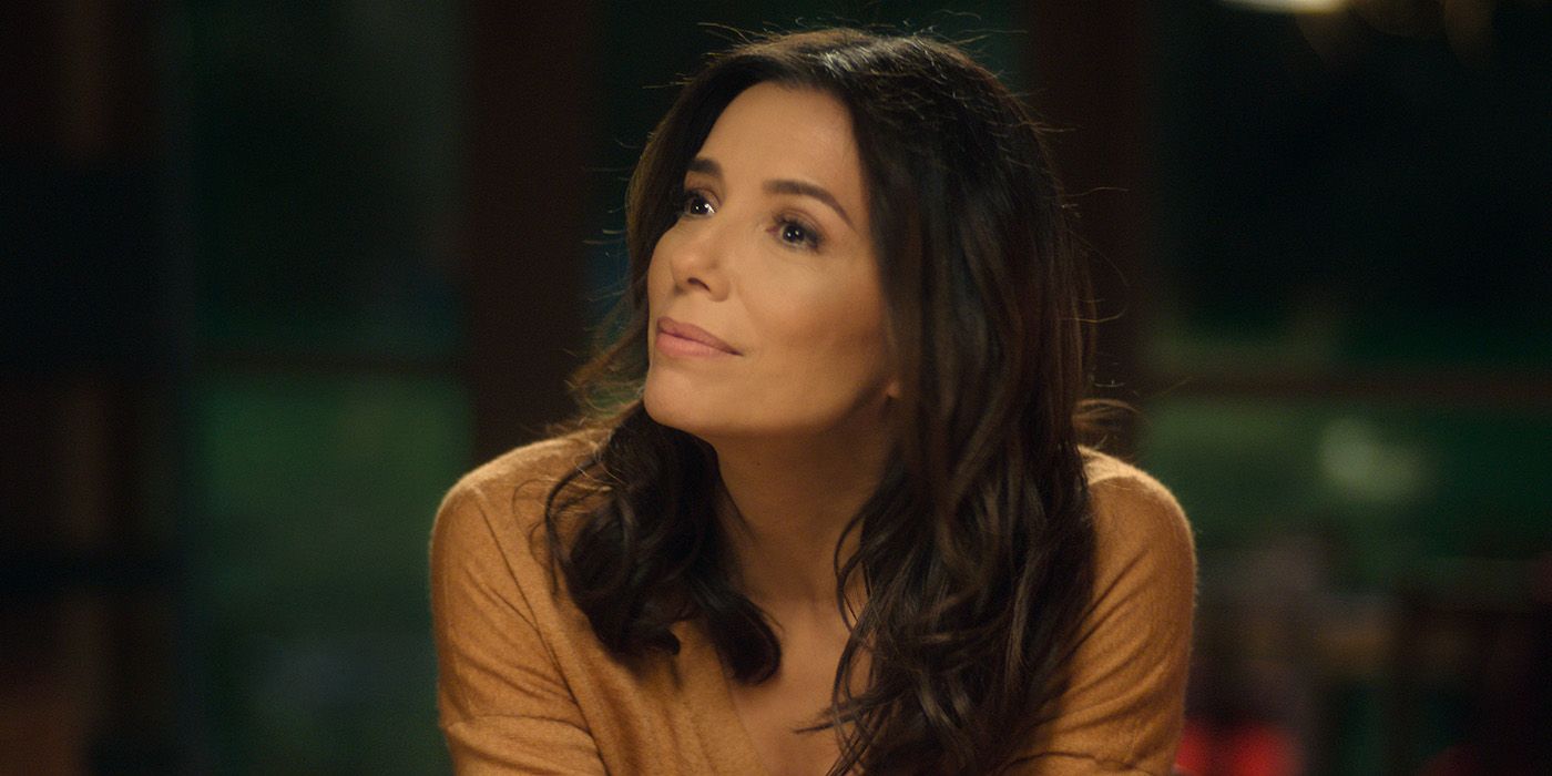 Eva Longoria in Land of Women wearing an orange shirt