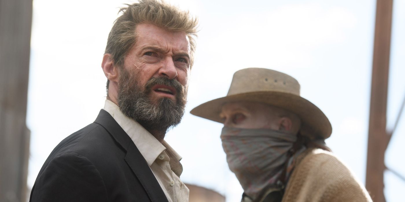 Hugh Jackman's Logan looking ahead, with Stephen Merchant's Caliban behind him in Logan