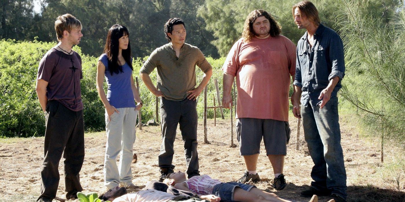 Dominic Monaghan, Yunjin Kim, Daniel Dae Kim, Jorge Garcia, and Josh Holloway standing over bodies in Lost.