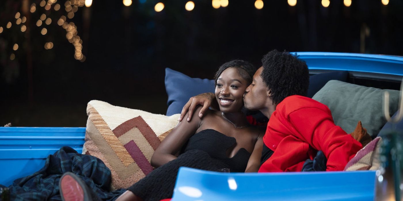 Serena Page and Kordell Beckham sit in the back of a blue truck for a 'Love Island USA' movie date