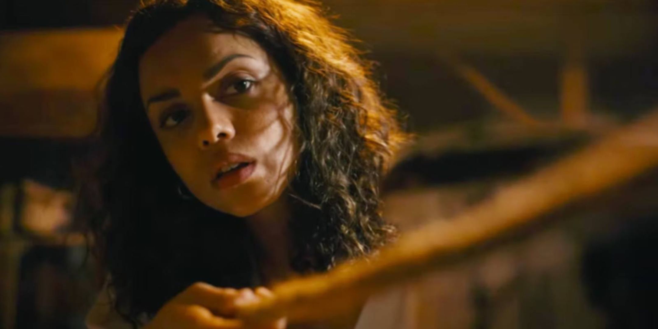 Georgina Campbell as Tess with a rope in the basement in Barbarian