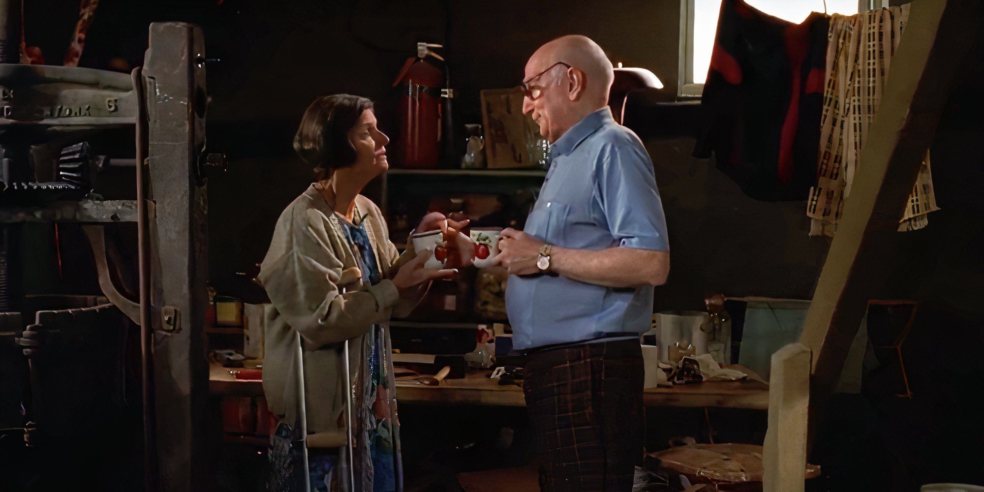 Mary Louise Wilson standing with Dominic Chianese both having coffee in The Sopranos