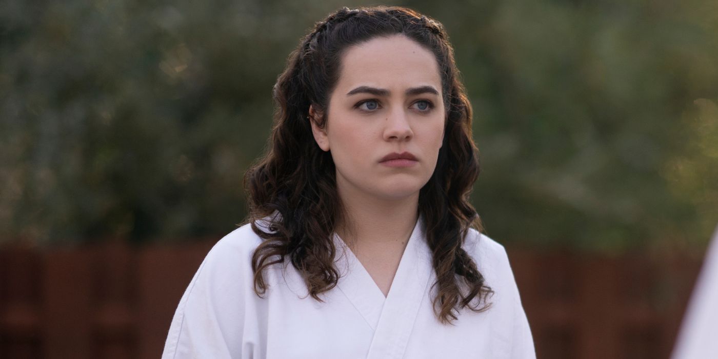 Mary Mouser outside and serious as Samantha LaRusso in Cobra Kai Season 6 Part 1.