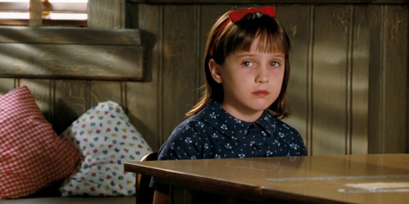 Matilda Wormwood sitting at a desk in Matilda. 